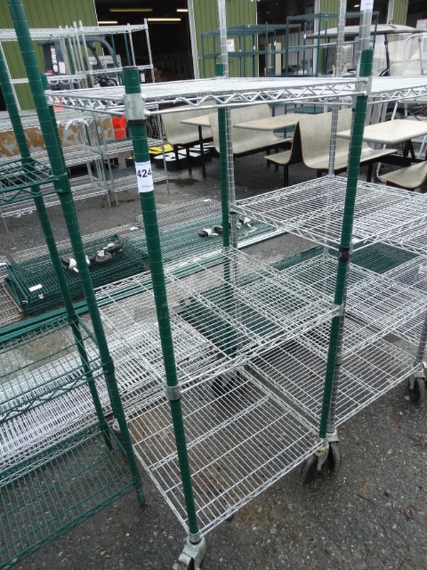 Metro Chrome Finish 3 Tier Shelving Unit w/ Green Finish Poles on Commercial Casters. 24x24x56. BUYER MUST DISMANTLE. PCI CANNOT DISMANTLE FOR SHIPPING. PLEASE CONSIDER FREIGHT CHARGES.