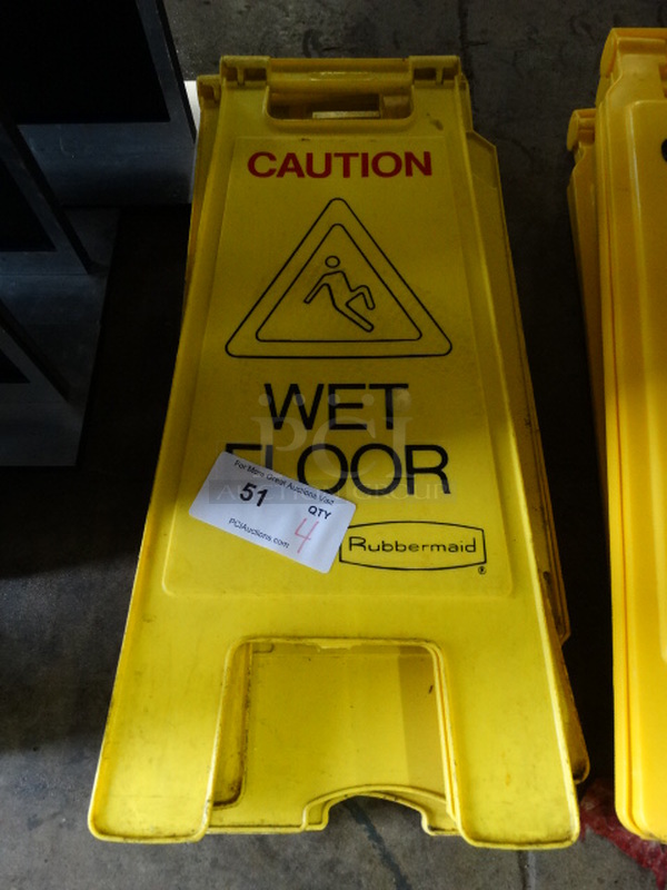 4 Yellow Poly Wet Floor Caution Signs. 11x7x24. 4 Times Your Bid!