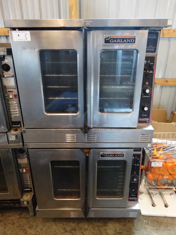 2 BEAUTIFUL! Garland Master 200 Stainless Steel Commercial Electric Powered Full Size Convection Ovens w/ View Through Doors, Metal Oven Racks and Thermostatic Controls on Commercial Casters. 38x40x70. 2 Times Your Bid! 