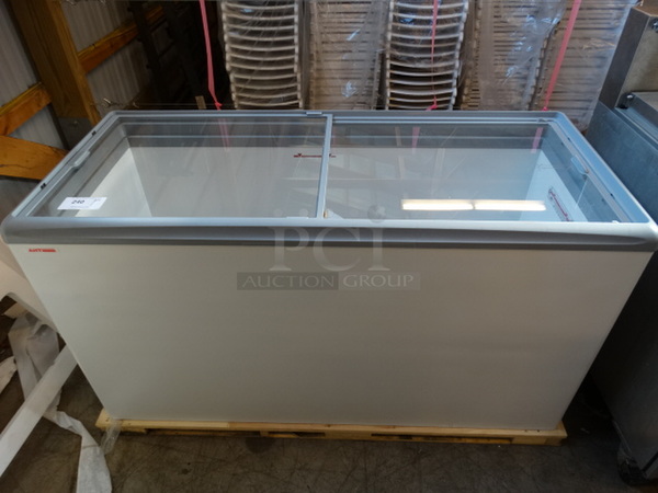 BRAND NEW! AHT Model RIO H150G Commercial Chest Freezer Merchandiser w/ 2 Sliding Lids on Commercial Casters. 120 Volts, 1 Phase. 60x25x35. Tested and Working!