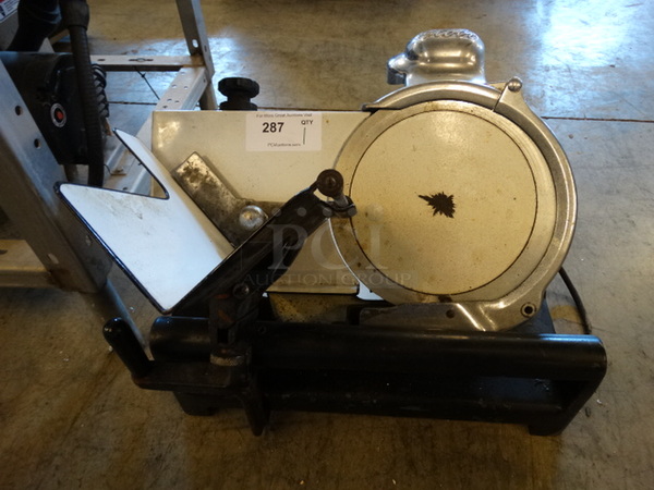 Globe Metal Commercial Countertop Meat Slicer w/ Blade Sharpener. 22x21x18. Tested and Powers On But Parts Do Not Move