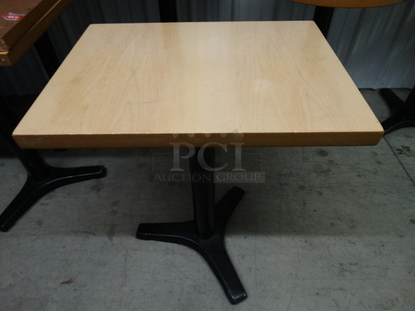 Wooden Rectangular Tabletop on Black Metal Table Base. Stock Picture - Cosmetic Condition May Vary. 24x18x30