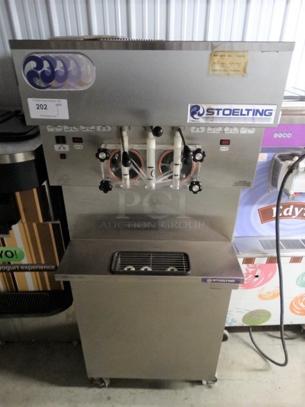 STUNNING! Stoelting Model U431-109 Stainless Steel Commercial Floor Style 2 Flavor w/ Twist Soft Serve Ice Cream Machine on Commercial Casters. 208-230 Volts, 3 Phase. 27x41x67