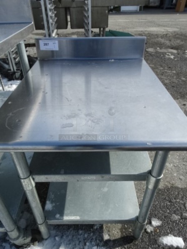 Stainless Steel Table w/ 2 Metal Undershelves. 24x30x33