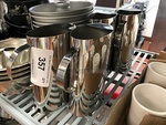 Four Stainless Steel Water Pitchers