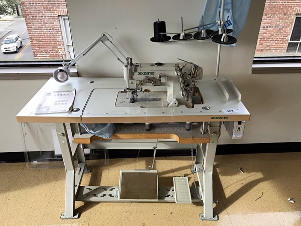 Zoje ZJ-W562-1 3-needle, 5-thread flat bed coverstitch machine (interlock) for light and medium materials. Basic Sewing, for general seaming and bottom hemming. 115v 1ph, Tested & Working!