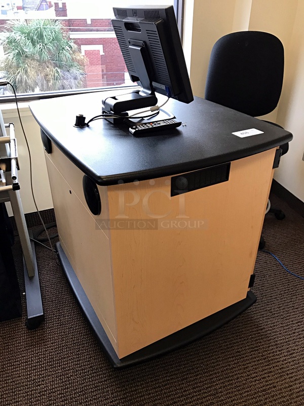 Smart Solution Presenter Podium on Casters Includes Presentation Switcher, JVC DVD & VHS Player, Built in Speakers & Herman Miller Task Chair - Image 1 of 4
