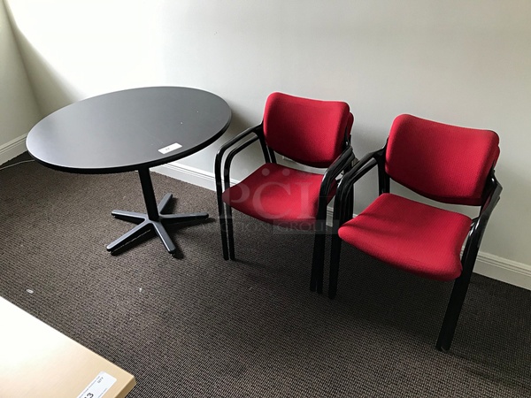 Round Meeting Table w/ Four Herman Miller Red Stackable Task Chairs - Image 1 of 3