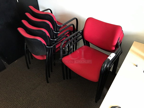 Seven Red Stackable Herman Miller Task Chairs