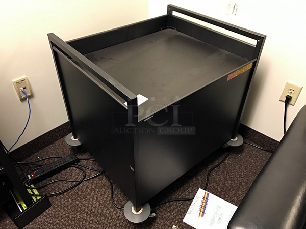 Rolling Black Metal Cart with Spring Loaded Lowerator Base - Image 1 of 2