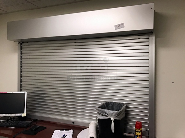 Counter Overhead Security Roll-a-Door - Image 1 of 3