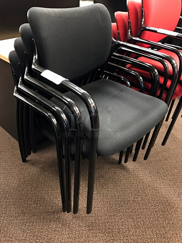 Four Stackable Black Herman Miller Side Chairs