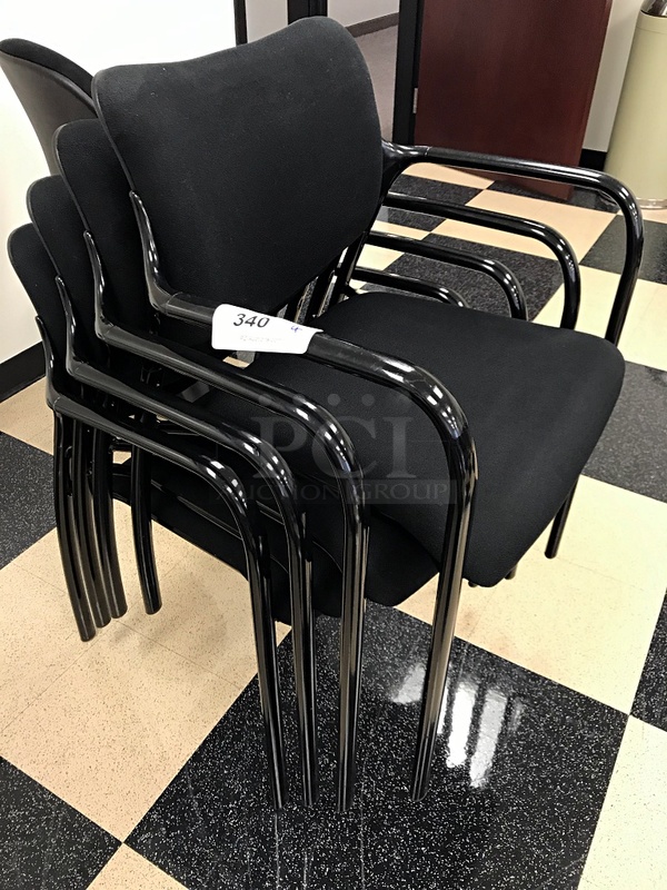 Four Black Stackable Herman Miller Side Chairs