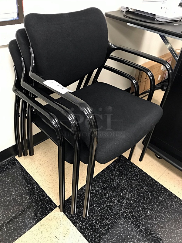 Three Black Stackable Herman Miller Side Chairs