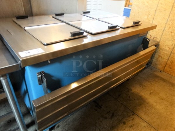 GREAT! Delfield Stainless Steel Commercial Chest Freezer w/ 3 Center Hinge Lids and Tray Slide on Commercial Casters. 50x34x32. Tested and Working!