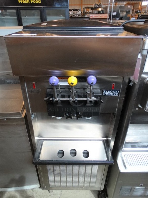 FANTASTIC! Electro Freeze Model SL500-132 Stainless Steel Commercial Floor Style 2 Flavor w/ Twist Soft Serve Ice Cream Machine on Commercial Casters. 208-230 Volts, 3 Phase. 22x32x60. Tested and Working!