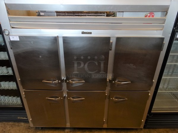 NICE! Traulsen Model GLT3-32NUT Stainless Steel Commercial Reach In Freezer w/ 6 Half Size Doors on Commercial Casters. 115/208 Volts, 1 Phase. 76x35x81. Tested and Working!