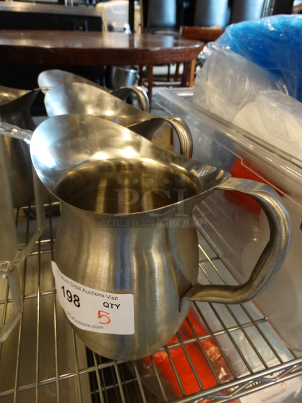 5 Metal Pitchers. 10x6x9.5. 5 Times Your Bid! - Image 1 of 3