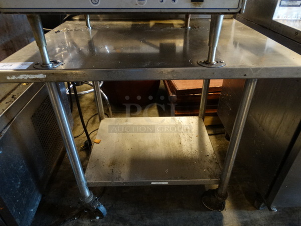Stainless Steel Commercial Table w/ Metal Undershelf on Commercial Casters. 36x30x40