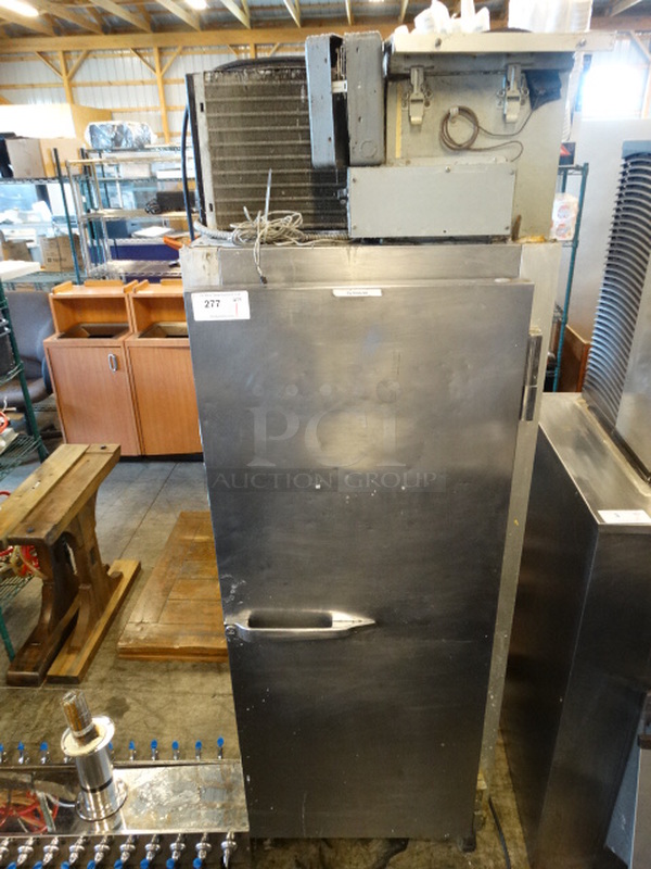NICE! McCall Model 4-4020F Stainless Steel Commercial Single Door Reach In Freezer on Commercial Casters. 115 Volts, 1 Phase. 28x36x84. Tested and Working!
