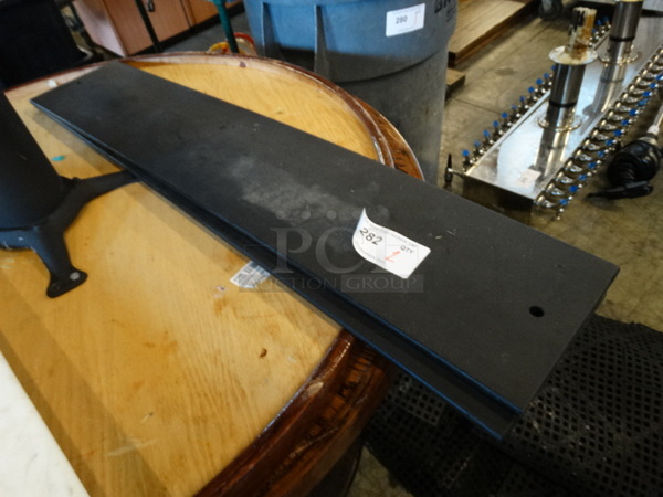 2 Black Cutting Boards. 42x8x0.5. 2 Times Your Bid! 