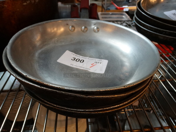 4 Metal Skillets. 18x10.5x2. 4 Times Your Bid! - Image 2 of 3