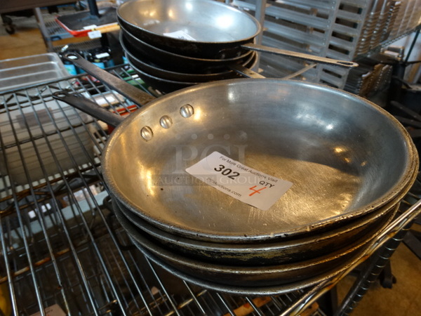 4 Metal Skillets. 18x10.5x2. 4 Times Your Bid! - Image 1 of 3