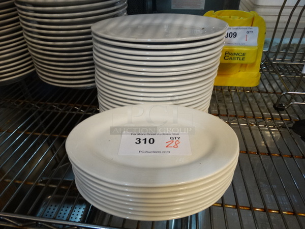 28 White Ceramic Oval Plates. 10x7x1. 28 Times Your Bid! - Image 1 of 3