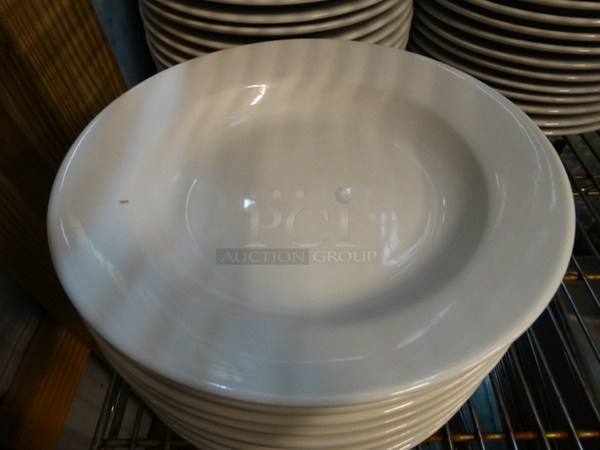 11 White Ceramic Plates. 10.5x10.5x1.5. 11 Times Your Bid! - Image 2 of 3