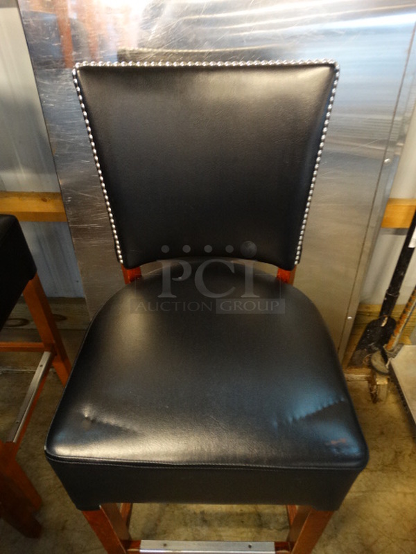 2 Bar Height Chairs w/ Black Cushions and Wood Pattern Frame. Stock Picture - Cosmetic Condition May Vary. 18x18x44. 2 Times Your Bid! - Image 3 of 4
