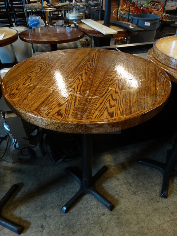 Butcher Block Wooden Pattern Round Tabletop on Black Metal Table Base. Stock Picture - Cosmetic Condition May Vary. 30x30x42