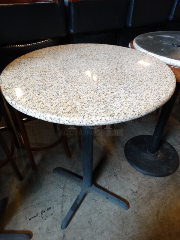 Granite Round Tabletop on Black Metal Table Base. Stock Picture - Cosmetic Condition May Vary but There are no Cracks. 30x30x42