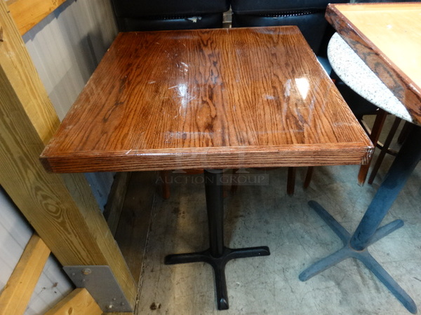 Wood Pattern Tabletop and Black Metal Bar Height Table Base. 28x28x42. Stock Picture - Cosmetic Condition May Vary.