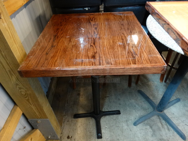 Wood Pattern Tabletop and Black Metal Bar Height Table Base. 28x28x42. Stock Picture - Cosmetic Condition May Vary. - Image 1 of 5