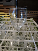25 Various Wine Glasses in Dish Caddy. 3x3x7. 25 Times Your Bid!