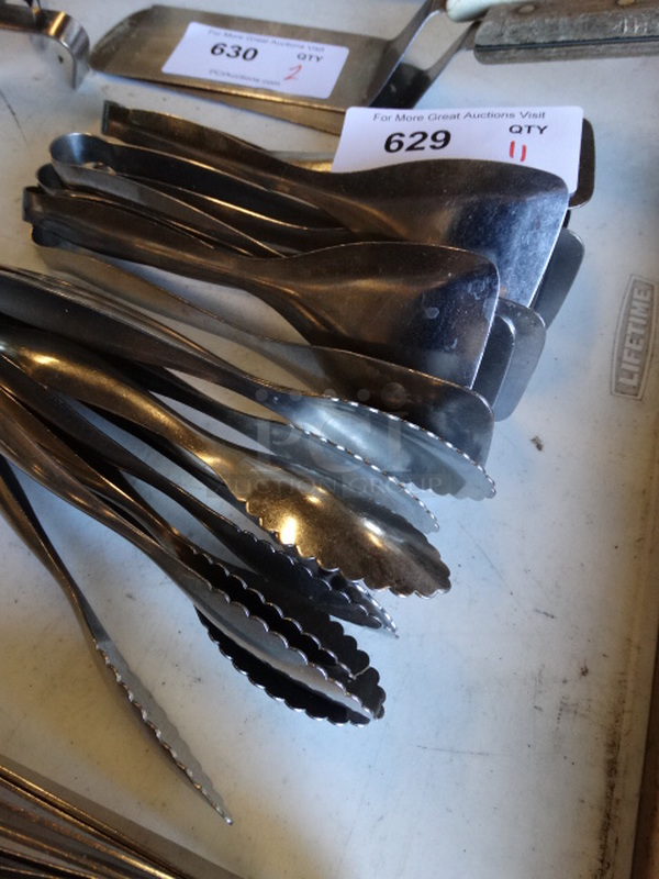 11 Metal Tongs. 9". 11 Times Your Bid! - Image 2 of 2