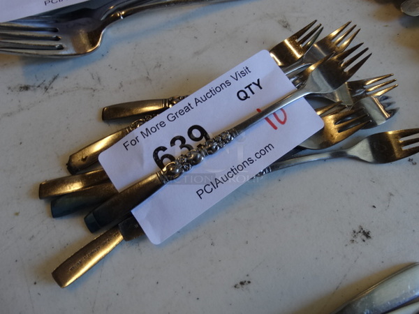 10 Metal Oyster Forks. 6