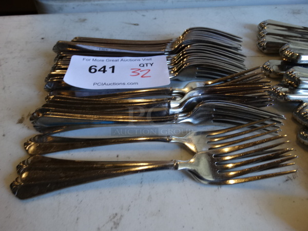 32 Metal Forks. 8