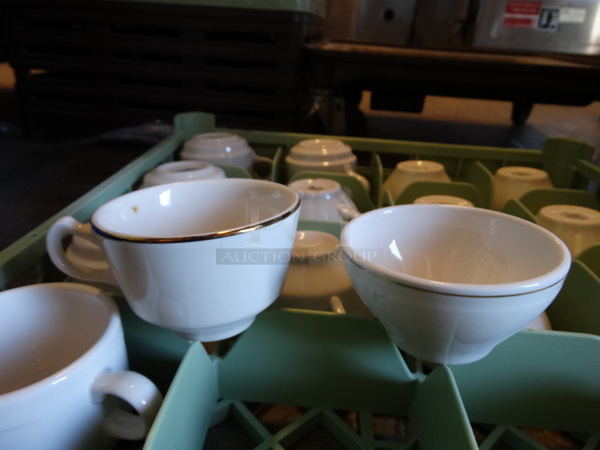 16 White Ceramic Bowls and Mugs in Dish Caddy. 5x2.5x3.5, 4x4x2. 16 Times Your Bid!