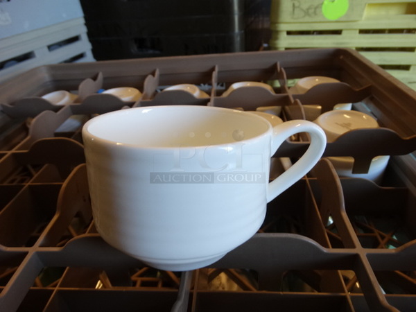 8 White Ceramic Mugs in Dish Caddy. 4.5x3.5x3. 8 Times Your Bid!