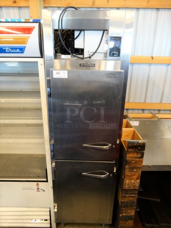 NICE! Traulsen Model AHT 1-32DUT Stainless Steel Commercial 2 Half Size Door Reach In Cooler. 115 Volts, 1 Phase. 24x35x83. Tested and Working!