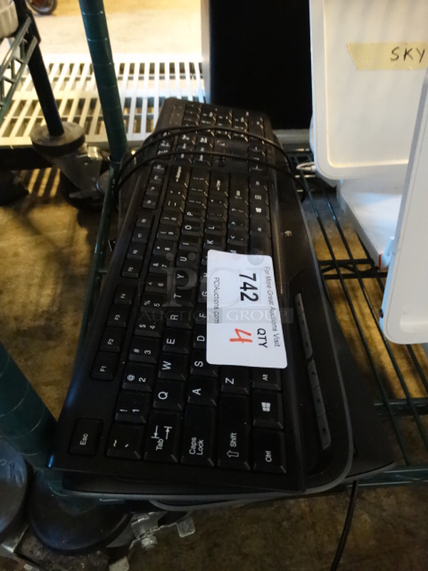 4 Keyboards. 17.5x5.5x1. 4 Times Your Bid! - Image 1 of 2