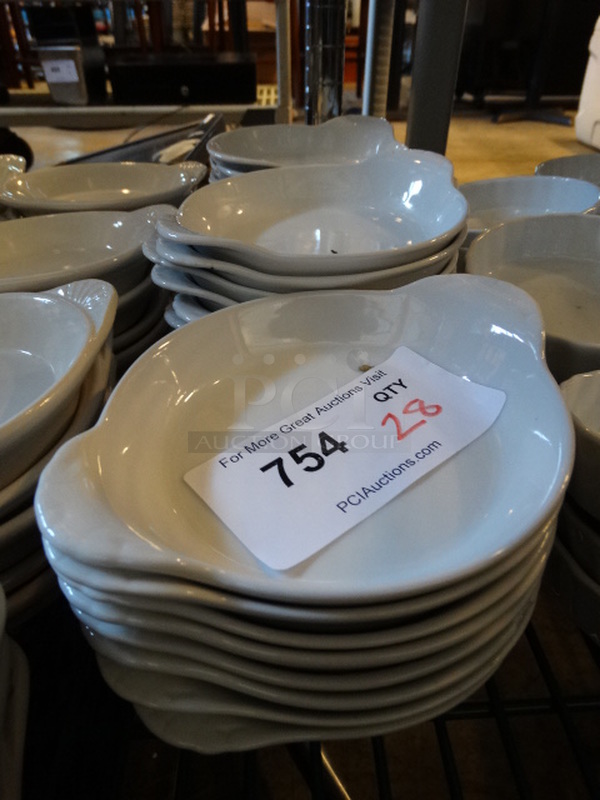 28 White Ceramic Single Serving Casserole Dishes. 6.5x5.5x1. 28 Times Your Bid!