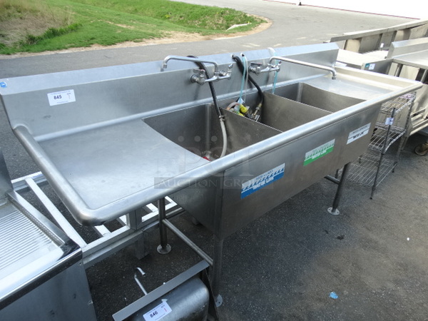 Stainless Steel Commercial 3 Bay Sink w/ Dual Drainboards, 2 Faucets and 2 Handles. 96x30x44. Bays 18x24x13. Drianboards 12x16x1 - Image 1 of 4