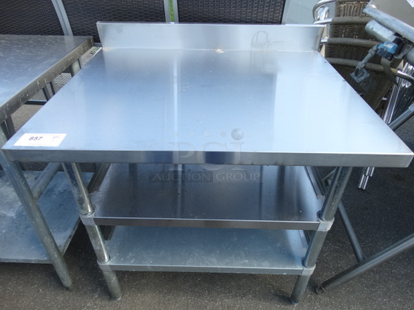 Stainless Steel Commercial Table w/ 2 Metal Undershelves. 36x30x38