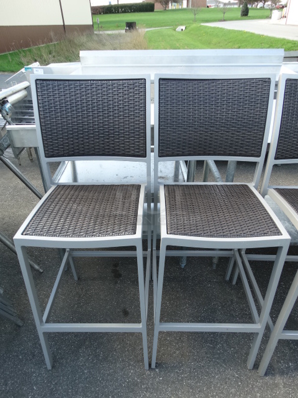 2 Gray Metal Bar Height Chairs w/ Brown Seat and Backrest. Stock Picture - Cosmetic Condition May Vary. 19x21x46. 2 Times Your Bid!