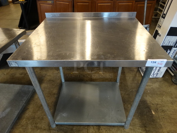Stainless Steel Tabletop and Metal Undershelf. 36x30x4, 31x25x2.5