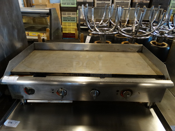 NICE! APW Wyott Stainless Steel Commercial Countertop Gas Powered Flat Top Griddle. 48x26x16 - Image 1 of 7