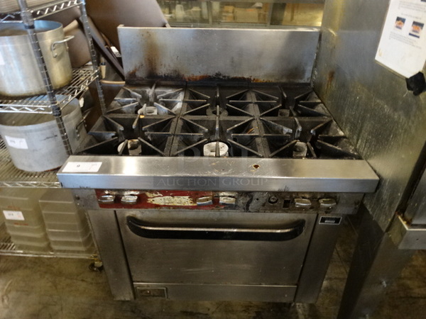 WOW! Southbend Stainless Steel Commercial 6 Burner Range w/ Lower Oven on Commercial Casters. 37x34x48