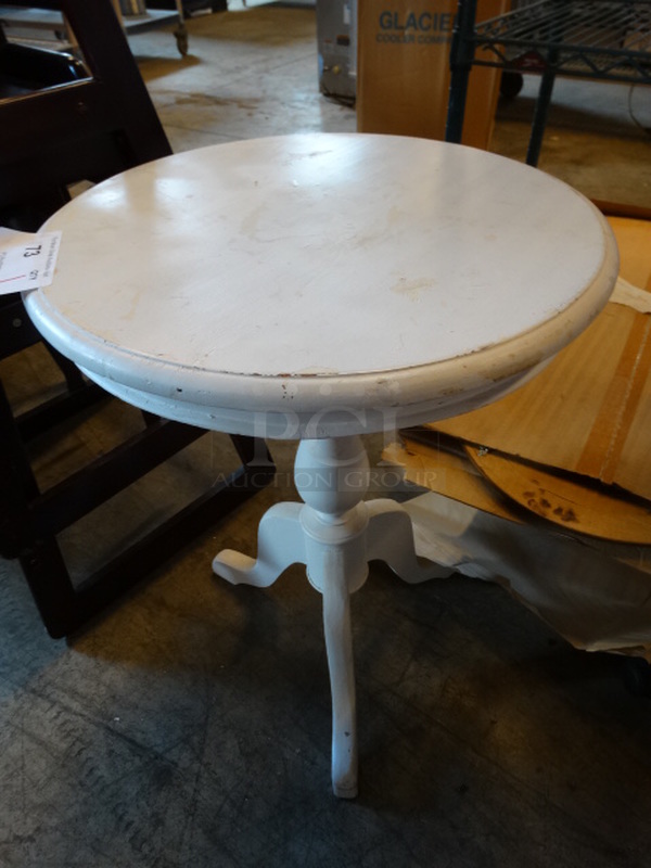 White Round Table. Stock Picture - Cosmetic Condition May Vary. 20x20x27